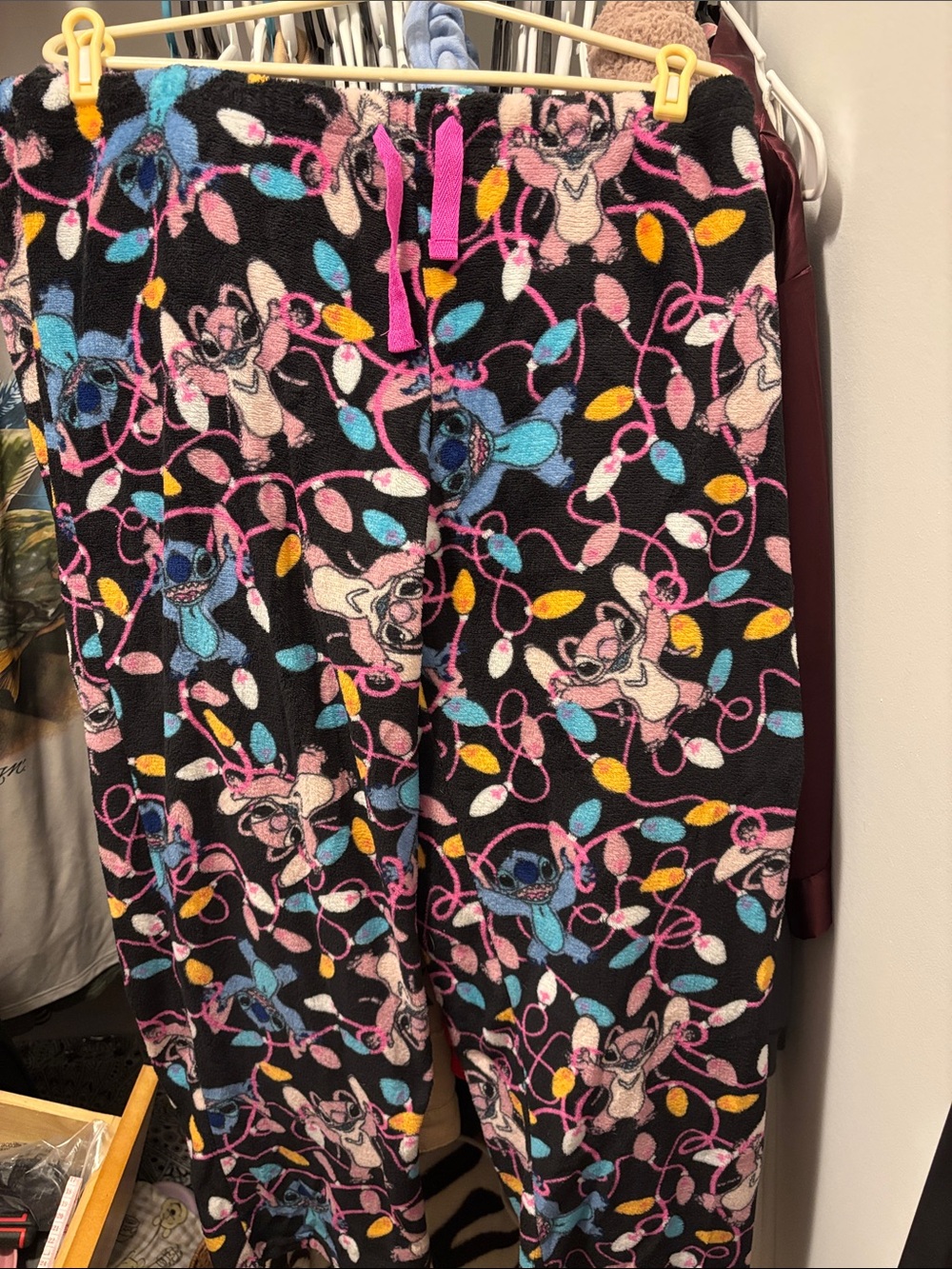 Disney Black Fleece Joggers with Pink Blue Yellow Holiday Lights